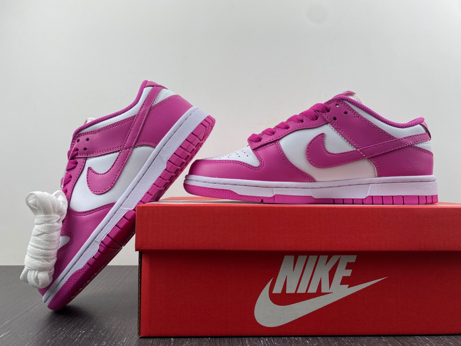 nike dunk low gs “active fuchsia” fj0704-100